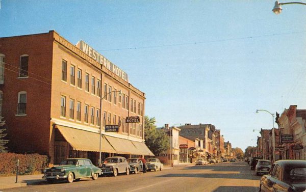 Big Rapids Michigan Main Street Scene Western Hotel Vintage Postcard K101001