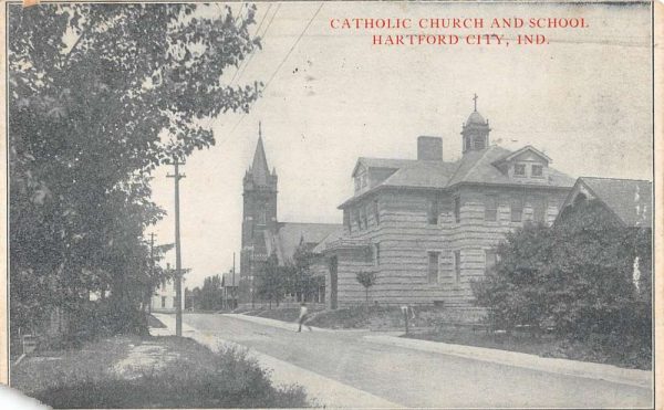 Hartford City Indiana Catholic Church Street View Antique Postcard K103572