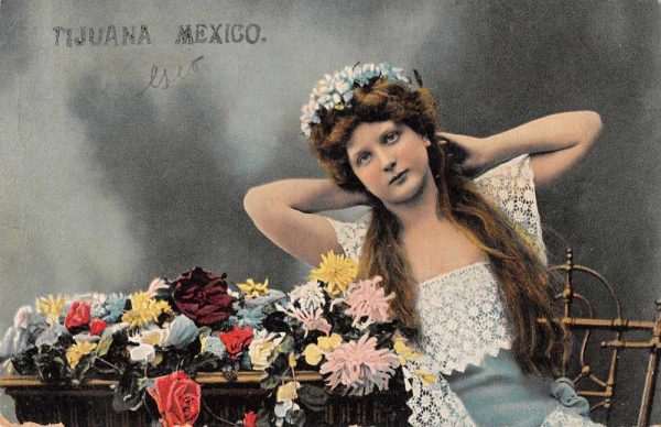 Tijuana B.C. Mexico pretty young lady with flowers antique pc ZD549884