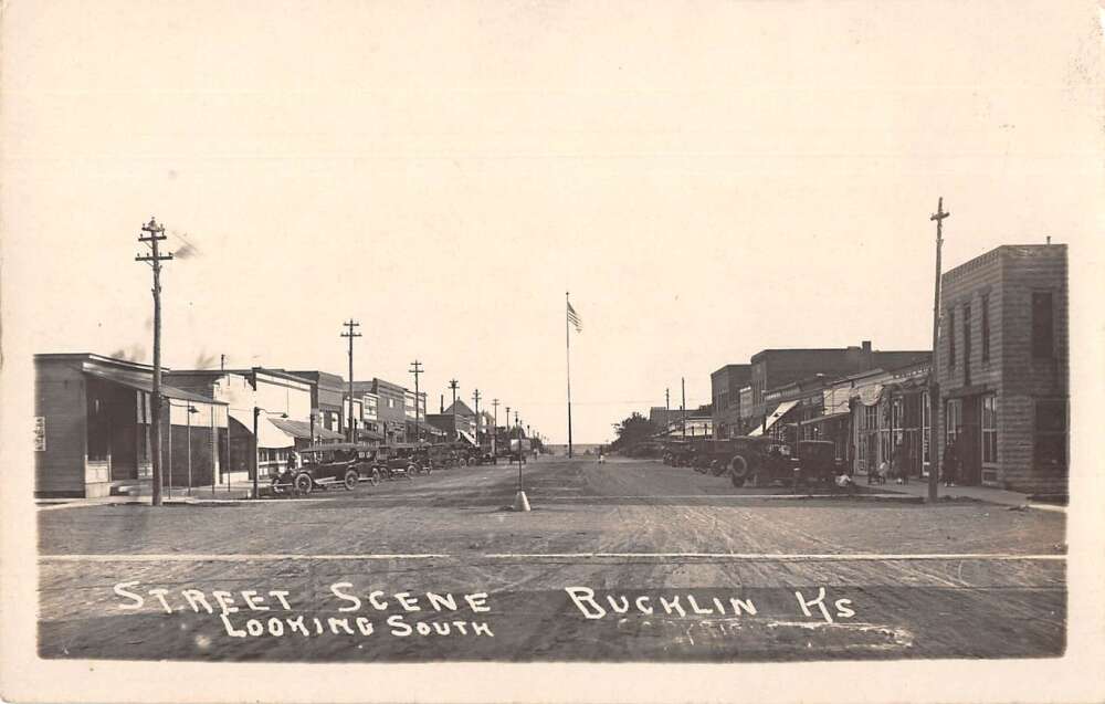 Bucklin Kansas Street Scene Looking South Real Photo Postcard AA21698