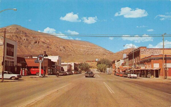 Arco Idaho Main Street Texaco station in view Vintage Postcard U638