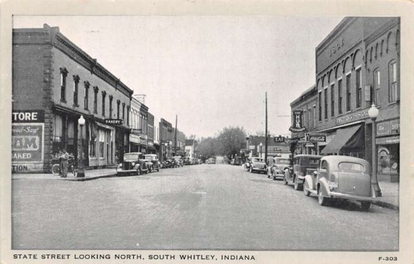 South Whitley Indiana State Street Looking North Coca Cola Sign Postcard U2657