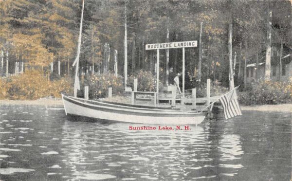 Sunshine Lake New Hampshire Woodmere Landing Boat at Dock Postcard AA65017