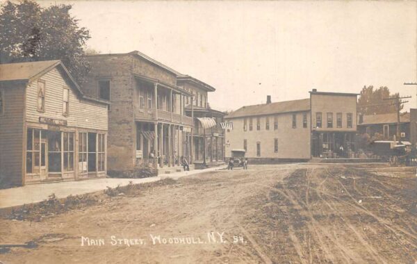 Woodhull New York Main Street Business Section Real Photo Postcard AA65588