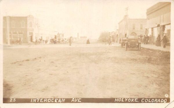 Holyoke Colorado Interocean Avenue Street Scene Real Photo Postcard AA66004