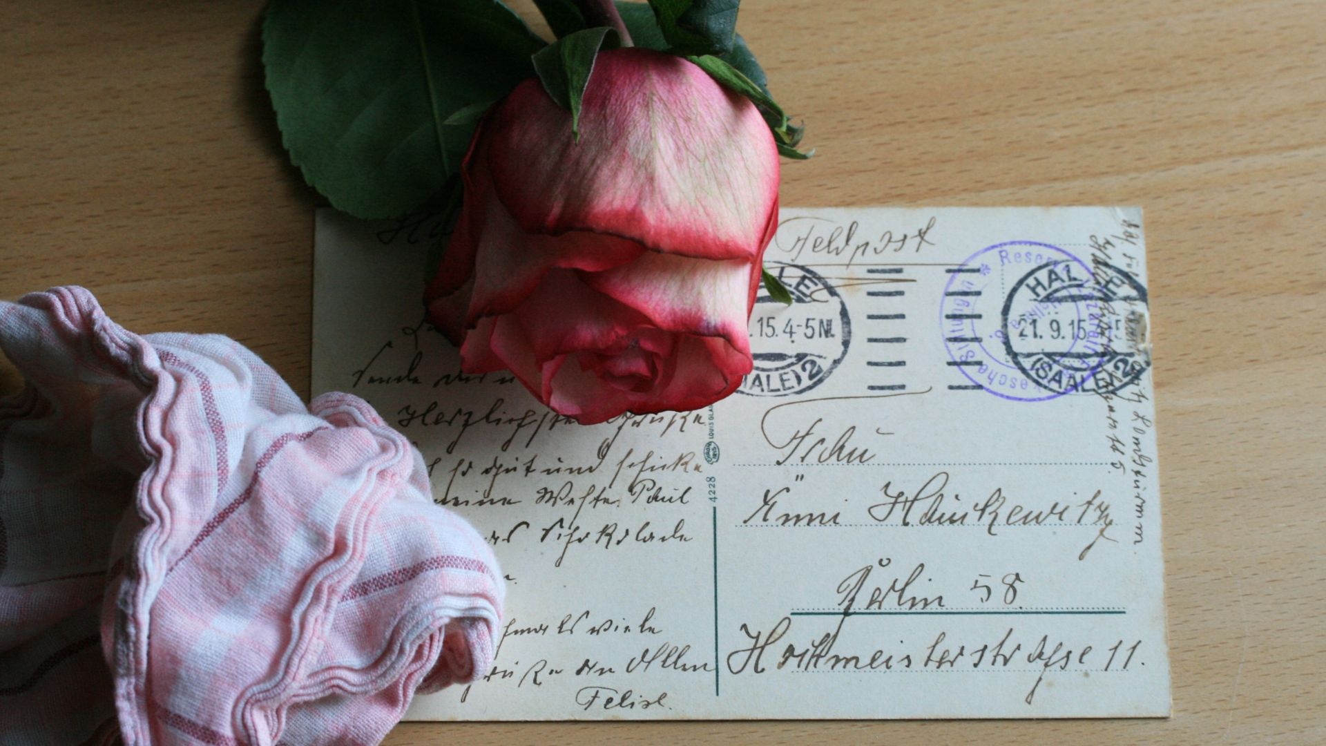vintage postcard surrounded by roses