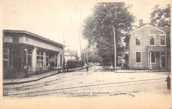 Tyrone Pennsylvania Washington Avenue Street Scene Meat Market Postcard AA77218