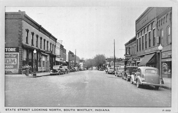 South Whitley Indiana State Street Looking North Coke Sign Postcard AA77693