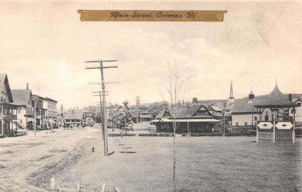 Orleans Vermont Main Street and Train Station Vintage Postcard AA82769