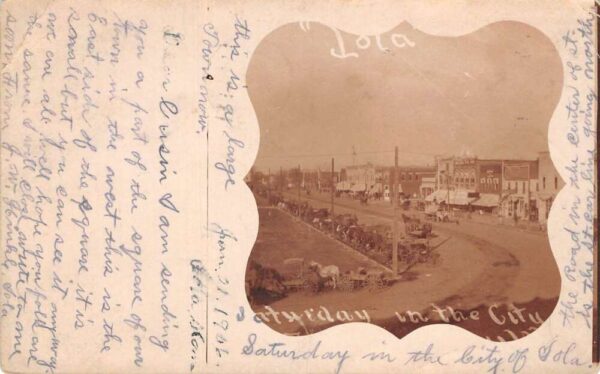 Iola Kansas East Side Square Horse Carriages Real Photo Postcard AA94196