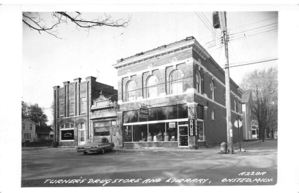 Onsted Michigan Turners Drug Store and Library Real Photo Postcard AA91959