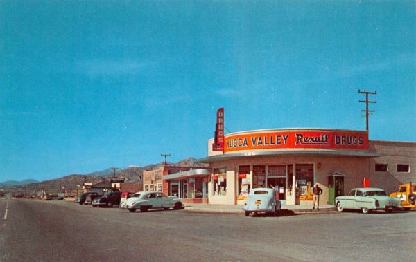 Yucca Valley California Rexall Drug Store Street Scene Vintage Postcard AA88367