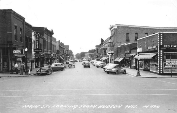 Hudson Wisconsin Main Street Drug Store Liquor Real Photo Postcard AA89507