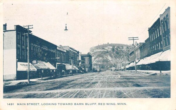 Red Wing Minnesota Main Street Looking to Barn Bluff Vintage Postcard AA89509