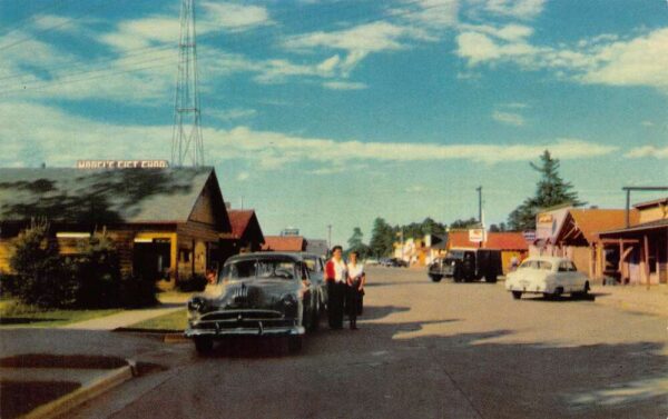 Lac du Flambeau Wisconsin Business District Street Scene Postcard AA89858