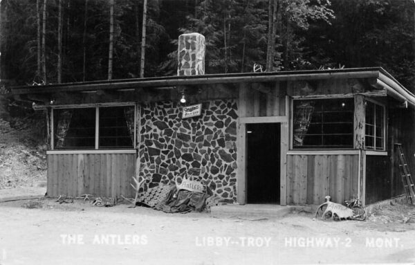 Libby Troy Montana Highway 2 The Antlers Miller Beer Sign Real Photo PC AA100295