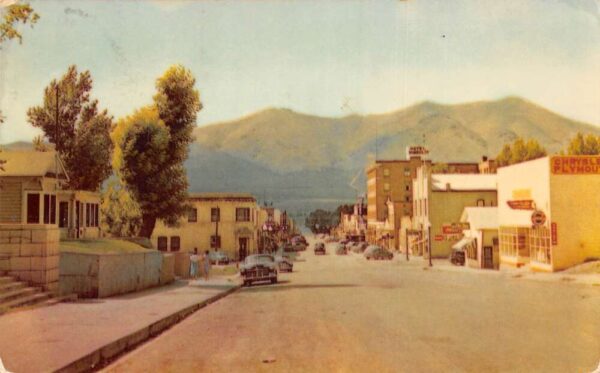 Winnemucca Nevada Bridge Street Chrysler Plymouth Vintage Postcard AA100497
