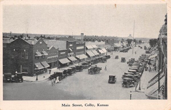 Colby Kansas Main Street, Drug Store, Vintage Postcard U23063