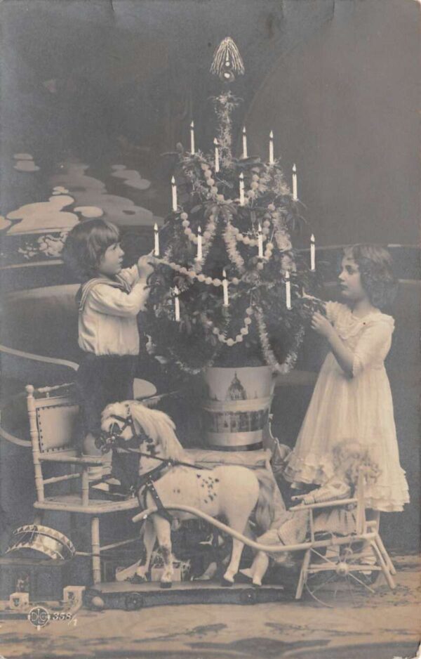 Christmas Greetings Children Decorating Tree Real Photo Vintage Postcard AA86328