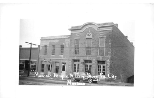 Virginia City Montana Masonic Temple and Drug Store Real Photo Postcard AA102865