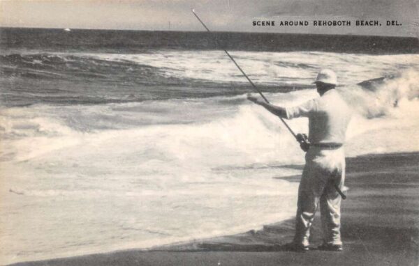 Rehoboth Beach Delaware Man Fishing at Beach Vintage Postcard AA84960