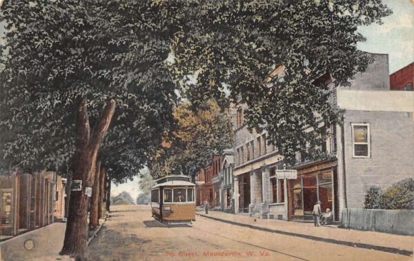 Moundsville West Virginia 7th Street Trolley Drug Store Postcard AA104462
