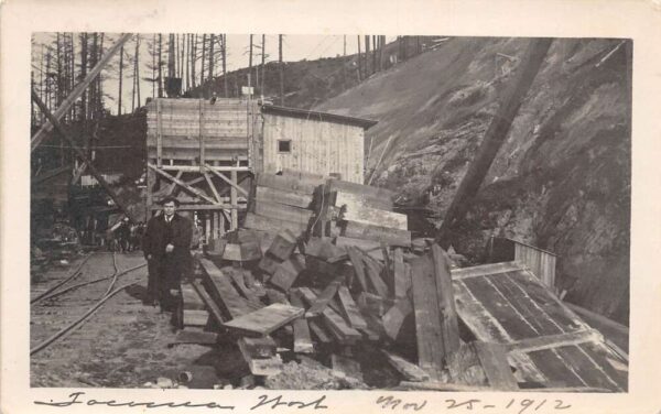 Tacoma Washington Logging Camp Man by Lumber Real Photo Postcard AA104836