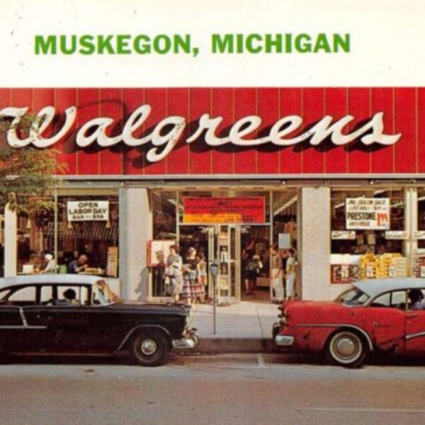 vintage postcard with red car parked in front of red Walgreens