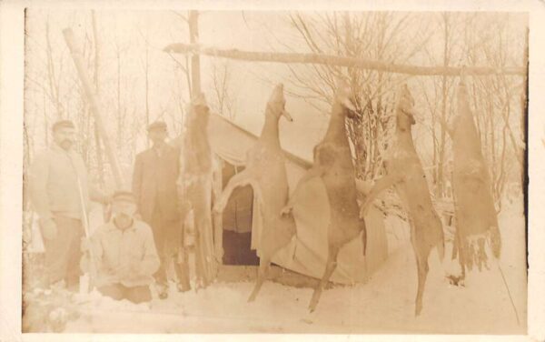 Newberry Michigan Hunters with Deer Winter Camp Tent Real Photo Postcard AA85744